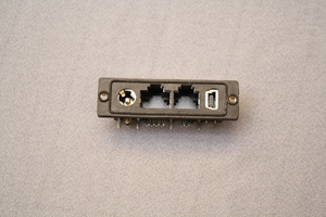 TT31-203018 Printbøsning: RJ45-RJ11-DC-MiniUSB Print 90° skærmet